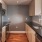 galley kitchen with open countertop