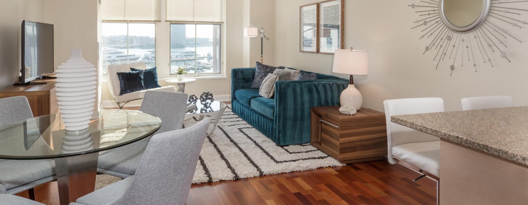 large windows brighten spacious living room