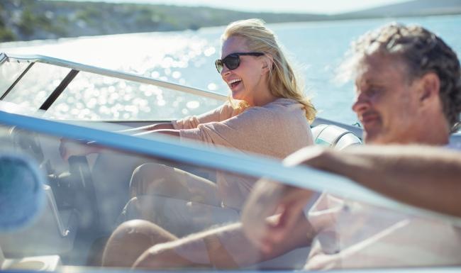 a man and woman on a boat