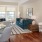 large windows brighten spacious living room