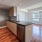 serving counter in kitchen open to living room